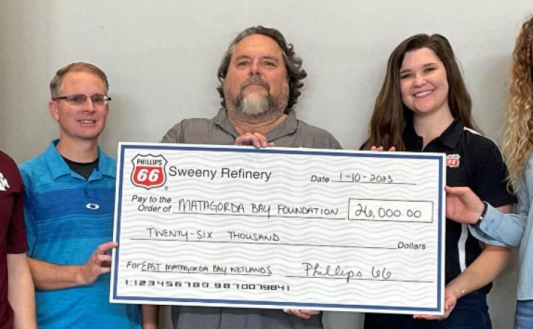 Contributed photo Phillips 66 presents donation to Matagorda Bay Foundation and Texas A&M AgriLife researchers for East Matagorda Bay Wetlands Project on Jan. 11.