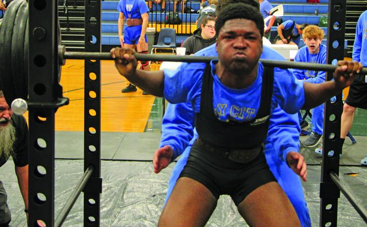 Sentinel Photo/Mike Reddell Bay City powerlifter is Zion Sanders - 165 class - exerts on this lift at the BCHS powerlifting meet Saturday, Feb. 11.