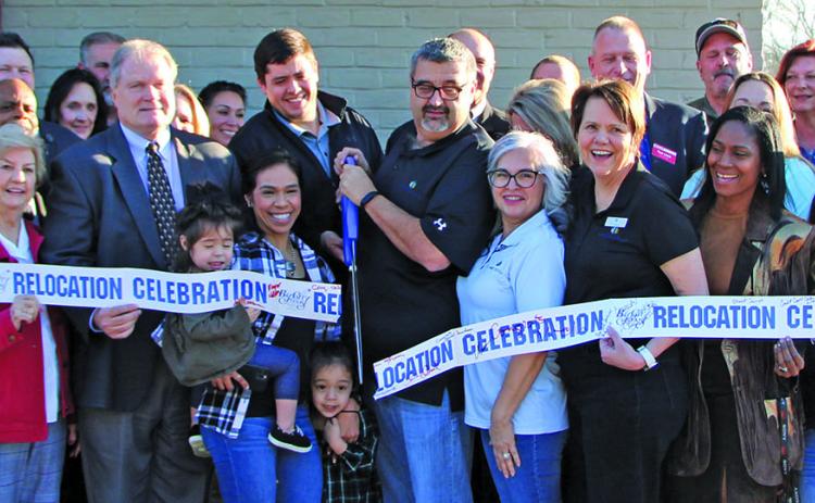 Sentinel photo/Mike Reddell The Lynn Group held a grand opening and ribbon cutting for its new corporate offices at 2200 Ave. A on Thursday, Jan. 26.