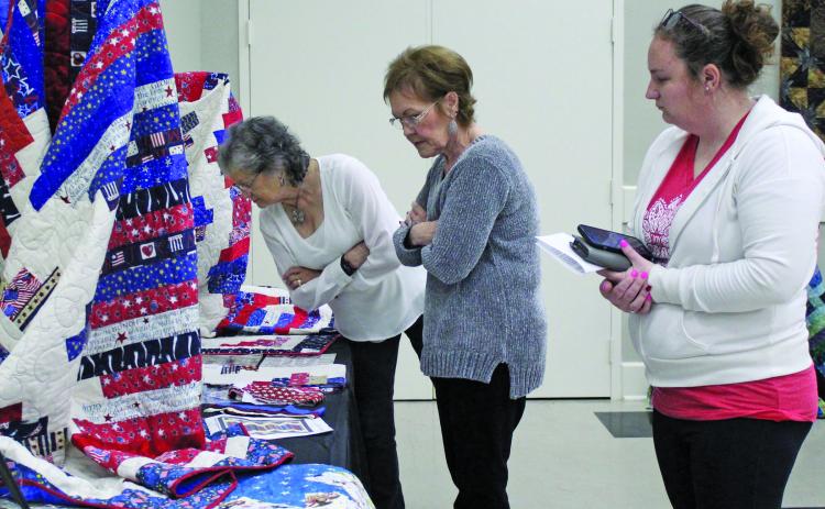 Sentinel Photo/Jessica Shepard The Memory Makers Quilt Guild annual exhibit is now on display at the Matagorda County Museum until Saturday, March 11. View over 40 assorted quilted items, vote for your favorite quilt, and enter the Guild's raffle for a chance to win one of six prizes. Raffle tickets are available for purchase at the museum gift shop or guild members.