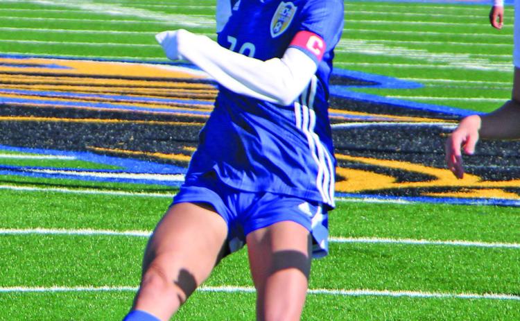 Sentinel Photo/Mike Reddell Bay City Lady Cat soccer (14-2, 6-0) shut out Wharton 8-0 at Memorial Stadium Saturday, Feb. 11 and was to play Palacios Monday, Feb. 13 - past the Sentinel’s press deadline. Senior forward Judah Breazeale (20) takes a shot at goal against Wharton. Bay City girls are first in District 22-4A-1.