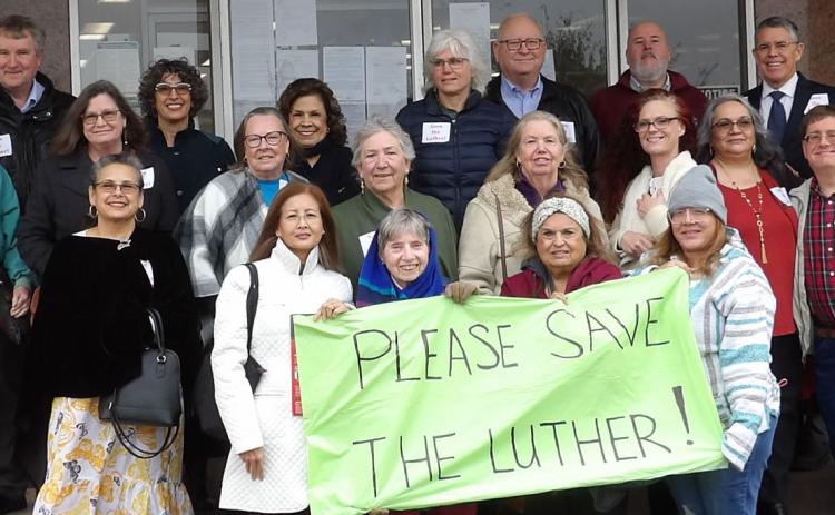Photo by Dr. Sandra D . Davidson Save the Luther Hotel supporters who attended a 23rd District Court hearing on a temporary injunction blocking a possible demolition gather for a group photo outside the Matagorda County Courthouse Feb. 2. District Judge Ben Hardin granted the temporary injunction and set another hearing for Feb. 16.