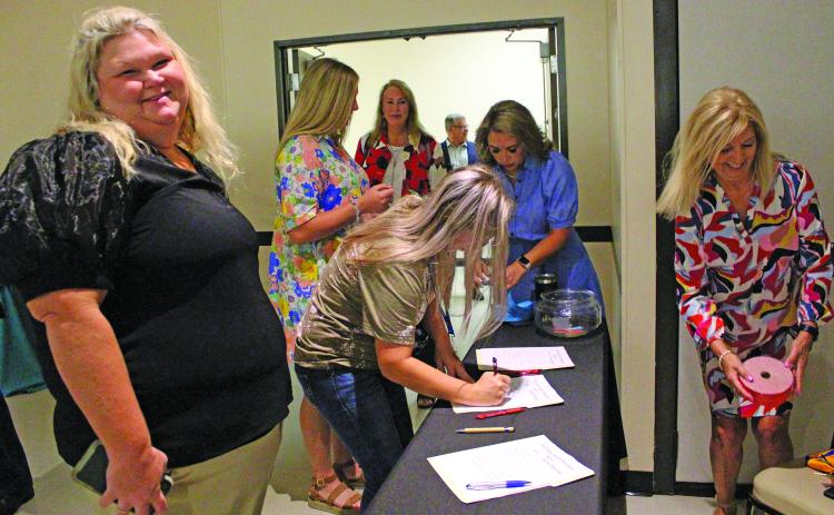 Sentinel Photo/Jessica Shepard Several new teachers check-in and got handed a door prize ticket as the Bay City Chamber of Commerce & Agriculture hosted its 37th Annual "New Teacher Breakfast' last Friday, Aug. 11. New teachers from Bay City, Van Vleck, and Matagorda ISD showed up to be recognized and supported by local businesses and private individuals.