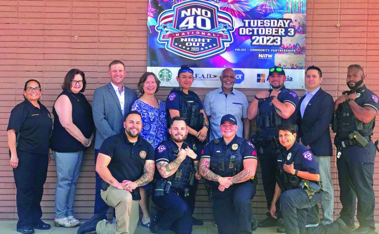 Contributed photo City Council and city officials join Bay City Police Department members in promoting National Night Out Tuesday, Oct. 3.