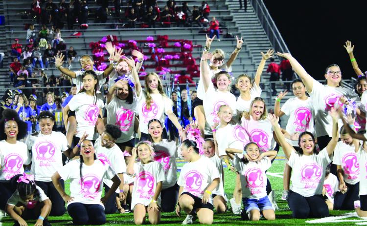 Halftime at the Bay City-El Campo game featured the Aristocats and the Little Aristocat Campers in a routine that ended with a group flourish. Bay City won the longtime rivalry game. See Sports, Page 6, for game details. Sentinel photo/Mike Reddell