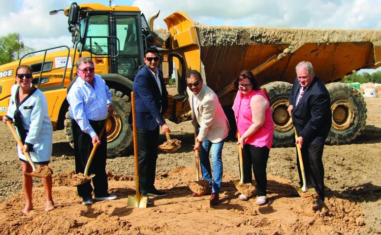 Sentinel Photo/Mike Reddell Groundbreaking for the Russell Ranch Subdivision Monday, Oct. 23, included, from left: Jessica Russell, BCCDC executive director; Jim Maddox, the subdivision developer; Zee Momin and Moez Momin, both connected with the project; City Manager Shawna Burkhart; and County Judge Bobby Seiferman.