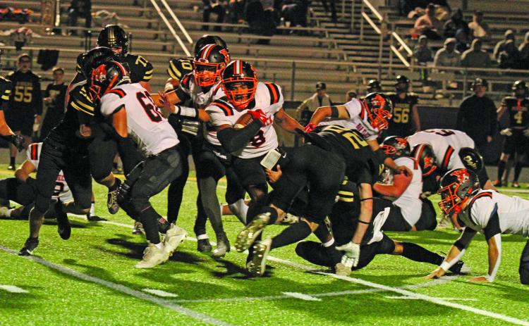 Anna Hernandez photo Van Vleck running back Keemar Allums (8) tries to break through the Rogers’ defense.