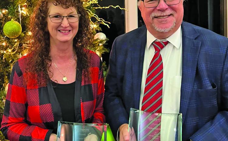 Contributed photo Chrystal Folse received the Tiger Lane community spirit award and Mike Ferdinand the George Holst Award at MCEDC’s annual meeting Dec. 13.