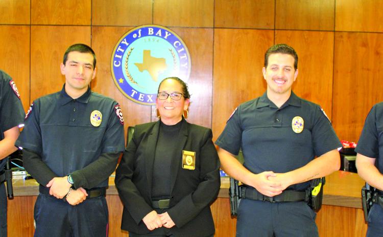 Sentinel Photo/Jessica Shepard At promotion ceremonies last week three new officers were sworn in and Sergeant Chris Hadash was pomoted to lieutenant. From left: Cody Janssen, Ryan Saucedo, Chief Christella Rodriguez, Braeden Fojtik and Hadash.