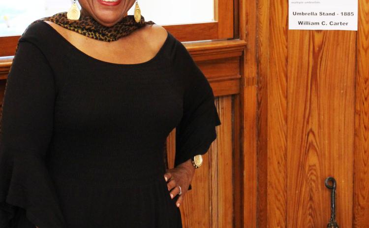 Donnye Stone, above, stands at the entrance of her annual "Black History Month" exhibit at the Matagorda County Museum. Stone's exhibit is on display in the museum's lobby until Wednesday, Feb. 28.