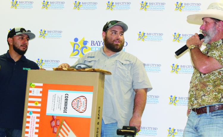 Sentinel Photos/Jessica Shepard The 14th Annual Great Steak Cook-Off's “Best Steak” award was given to  RWE Peyton Creek Wind Farm’s “Peyton Creek Cooking Company with team members Brandon Susuras, James Smith, Matthew Krenek, and Marco Flores Saturday, March 23.