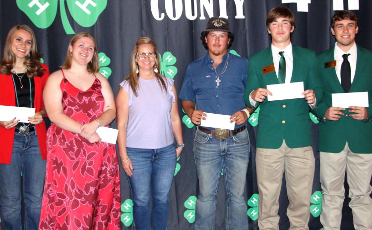 Sentinel Photo/Jessica Shepard $9,000 in scholarships went to Leeland Chandler, Madison Harris, Dylan Henry,  Landen Hurley, Lavery Riccio, and Slade Saha. President of the Matagorda County 4-H Adult Leader Association Kristy Moss presented the scholarships. Not all are pictured.