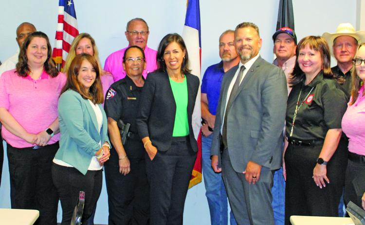 Sentinel Photo/Mike Reddell Federal Communications Commission (FCC) Chairwoman Jessica Rosenworcel (center) visited Emergency Operations Center last week to hear communication problems Matagorda County had following Hurricane Beryl’s landfall July 8.