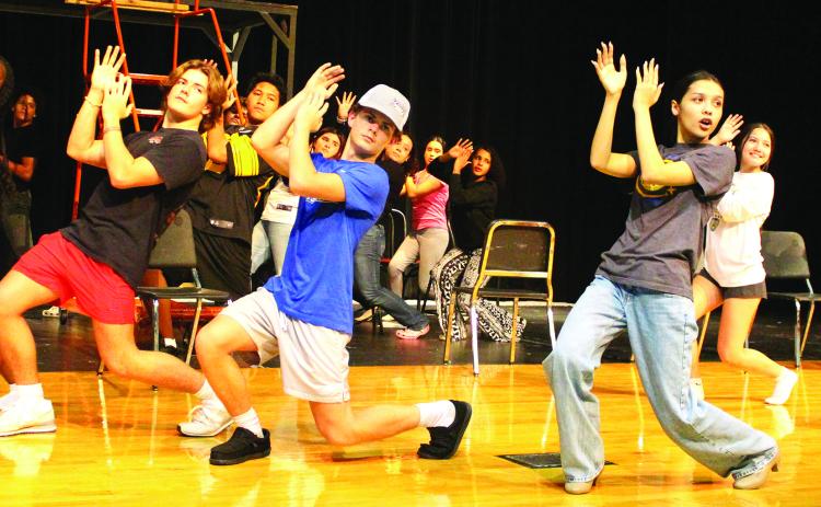 Sentinel Photo/Jessica Shepard Bay City High School Dungeoneers are hard at work during "Chicago: Teen Edition" rehearsal getting their choreography nailed down Monday, Oct. 7. The musical showcase debuts Thursday, Nov. 7 at 7 p.m. with tickets for sale online in advance and at the door.