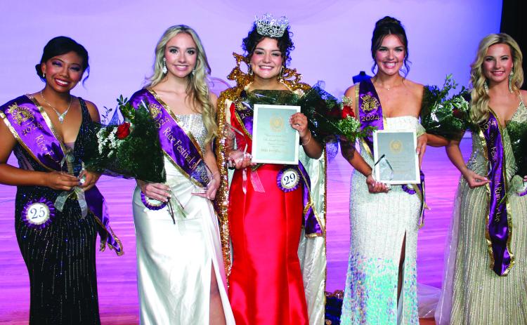 Sentinel photo/Jessica Shepard The Bay City Lions Club 2024 Rice Festival Queen is Victoria Sliva (center). Her court features 4th runner-up Tatiana Sanchez, 3rd runner-up Paislei Lee, 1st runner-up Kaylee Spencer, and 2nd runner-up Meredith Williams. The queen was crowned Saturday, Oct. 12.