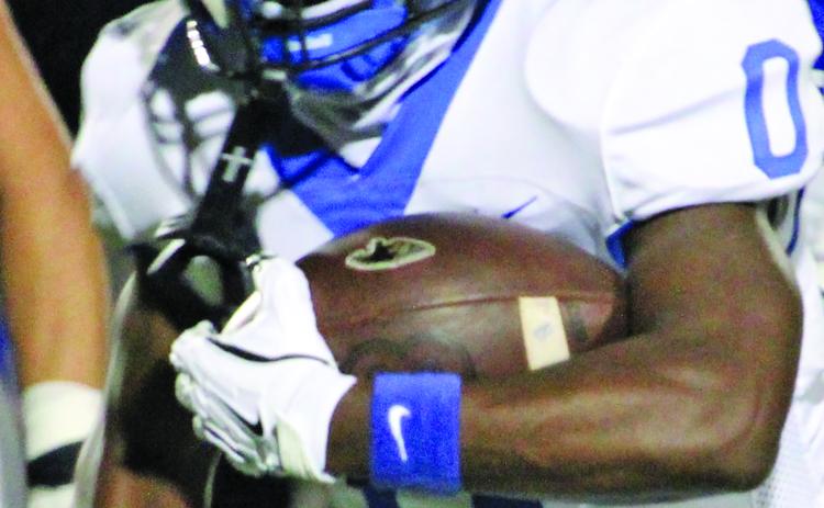 Sentinel Photo/Mike Reddell Bay City’s Jada Andrews (0) picks up yardage against La Vernia Friday. He slashed the Bears’ defense for 124 yards.
