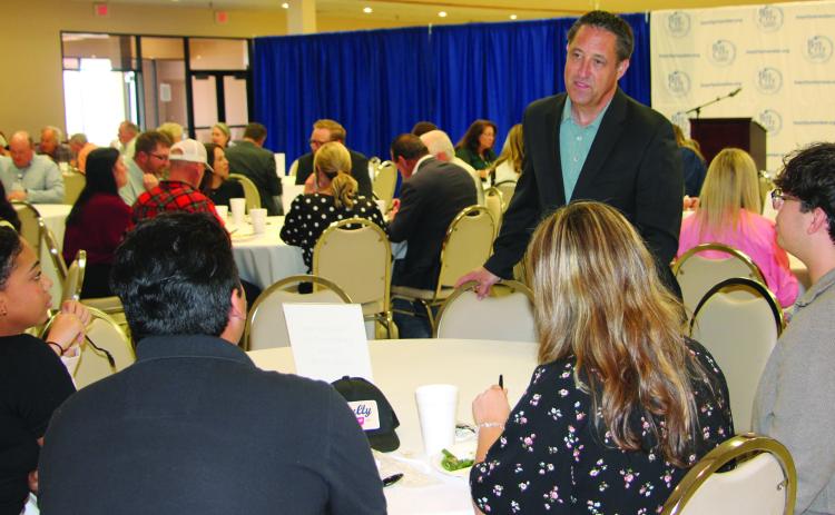 Sentinel Photo/Jessica Shepard Texas Comptroller Glen Hegar visits with Matagorda County Youth Leadership Class members prior to his chamber luncheon talk last week.