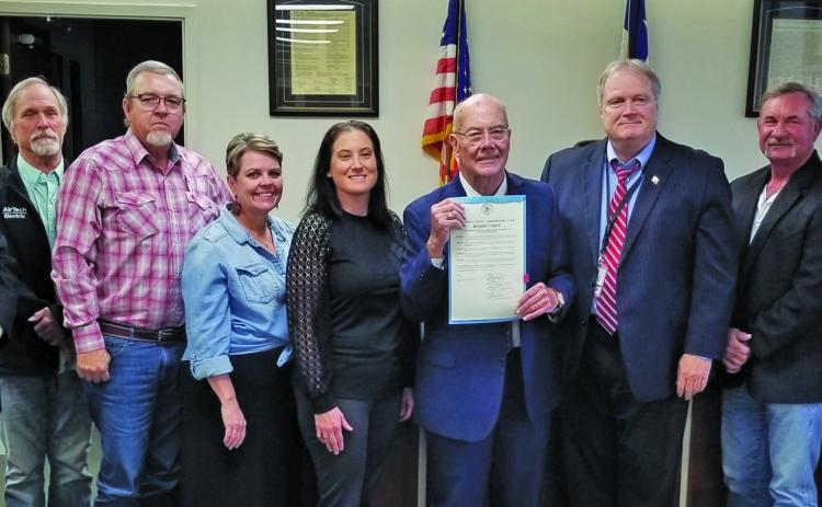 Sentinel Photo/Mike Reddell Commissioners Court honored Judge Ben Hardin, center, with a resolution noting his fairness, long years of service and being a good listener.