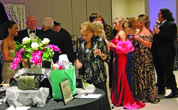 Sentinel Photo/Jessica Shepard Bay City Junior Service League held its annual "Charity Ball" fundraiser for local charities on Saturday, Feb. 1. For another JSL Ball photo see Page 8