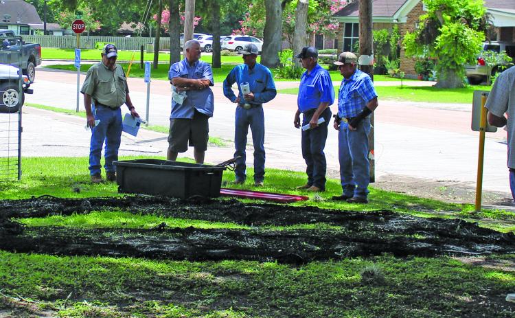 Sentinel Photo/Jessica Shepard Texas A&M Natural Resources Institute Program Coordinator Jay Long demonstrated a continuous net feral hog trap after his presentation at the Matagorda County SWCD #316 workshop on June 13. Long was one of six other speakers at the event.