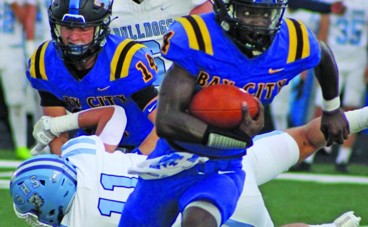 Sentinel Photo/Mike Reddell Blackcat junior running back Aiden Williams (4) was the leading rushing in the Blackcat victory over Sweeny.