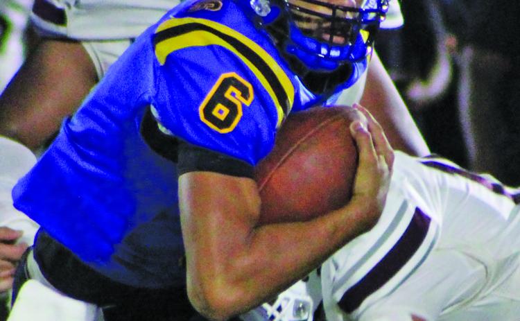 Sentinel Photo/Mike Reddell Blackcat junior Jonus Edwards (6) looks ahead after freeing himselft from Columbia defenders.