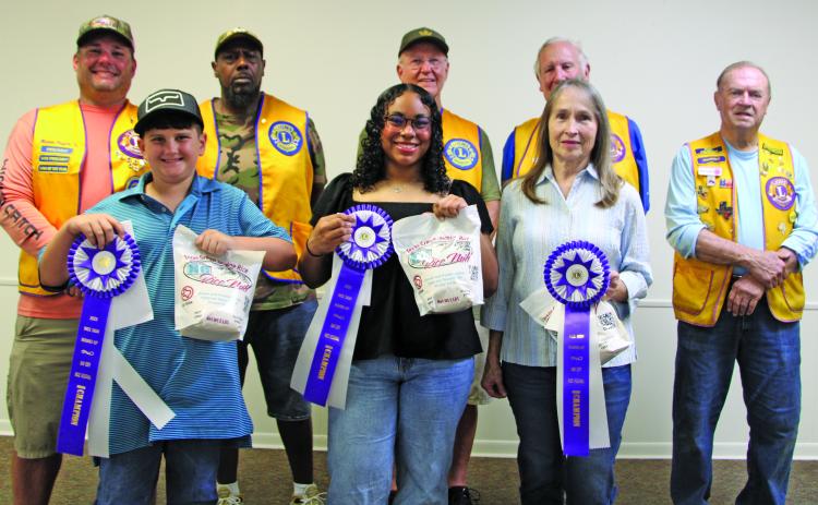 Sentinel Photo/Mike Reddell 2025 Rice Dish Roundup Grand Champion winners were chosen from each respective age division on Tuesday, Oct. 14. From left are Robert Porter, Nevaeh Mangum, and B. Trevino. Not pictured is Cora Romine.
