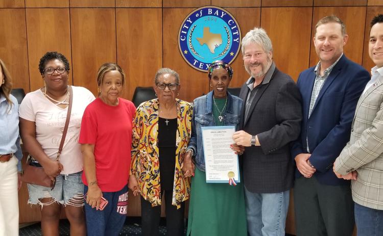 Sentinel Photo/Mike Reddell  Council delares a “Priscilla Ann Robinson Day,”- the longtime Bay City school trustee was photographed with Bay City ISD officials and school board members, as well as City Council and City Staff.