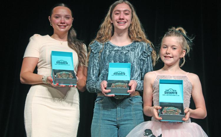 Sentinel Photo/Jessica Shepard MCFLA's 2026 Public Speaking buckle winners are: Ansley Kubecka, Madelyn Botbyl, and Lyra Saha.