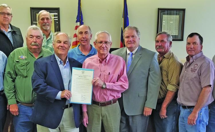 Sentinel Photo/Mike Reddell Former elected officials and business leaders were at a recent Commissioners Court meeting to show their support for the court to approve a resolution for naming a portion of Texas 35 as “Congressman Greg Laughlin Highway.” The resolution was approved unanimously.