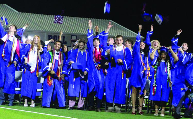 Sentinel Photo/Jessica Shepard Tidehaven High School graduates celebrate at last week’s commencement ceremonies.
