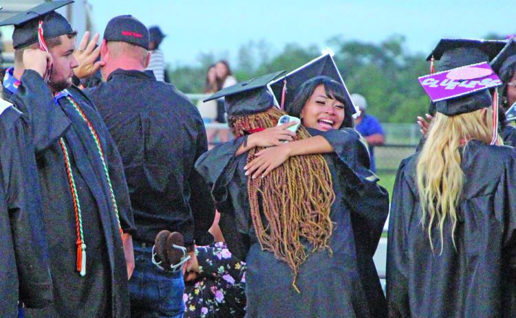 Sentinel Photo/Jessica Shepard Van Vleck High School graduates celebrate at Burl McKinney Stadium Thursday, May 21.