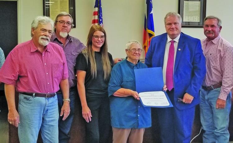 Sentinel Photo Commissioners Court accepted Texas Historical Commission’s Distinguished Service Award for Matagorda County Historical Commission at the court’s meeting Monday. MCHC member Edith Crower (center) shows off the state’s recognition. MCHC members Mike Reddell, second from left, and Kristi Lee also took part, with court members Commissioner Bubba Cook, Commissioner Bubba Frick, County Judge Bobby Seiferman, Commissioner Troy Shemek, and Commissioner Mike Estlinbaum.