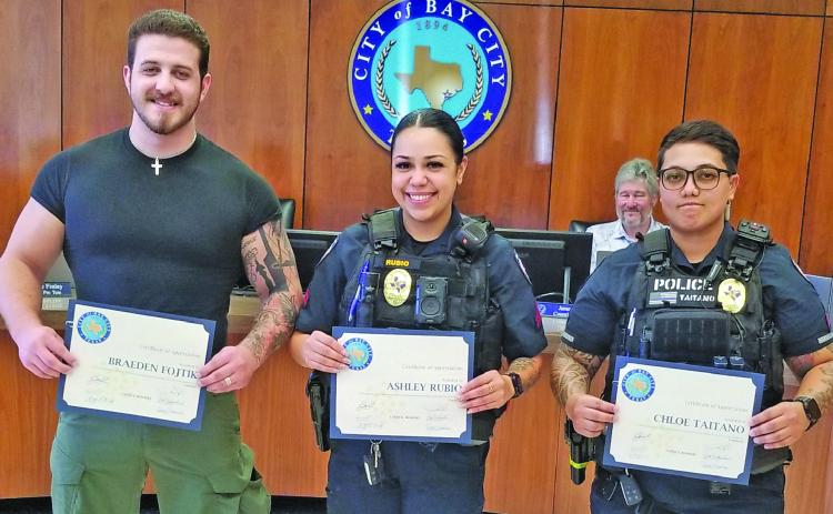 Sentinel Photo/Mike Reddell City Council recognized newly promoted Bay City Police officers last week. From left, are: Cpl. Braeden Fojtik, Cpl. Ashley Rubio, and Cpl. Chloe Taitano. Not pictured Sgt. Dillon Wakefield.