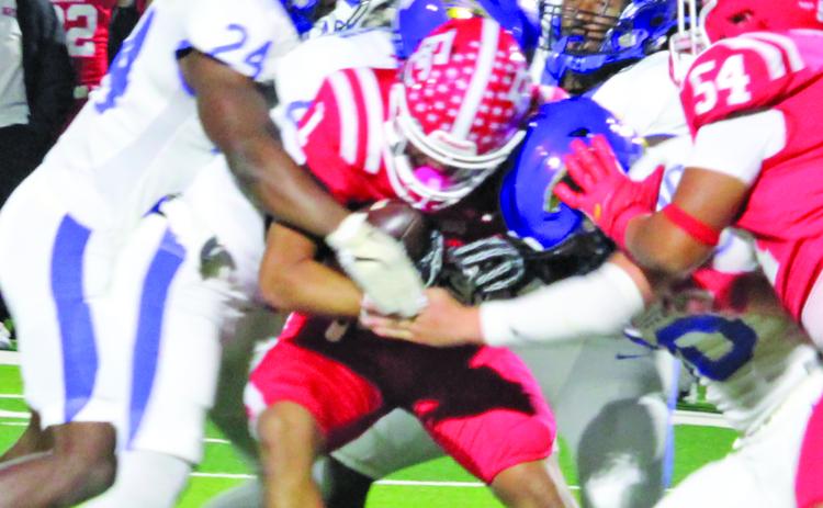 Sentinel Photo/Mike Reddell Blackcats converge on El Campo running for no yardage.