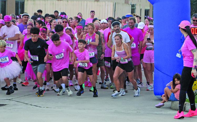 Sentinel Photo/Jessica Shepard Over 200 runners, walkers, and volunteers participated in Matagorda Regional Medical Center's "Pink Out 5K Run/Walk” on Saturday, Oct. 3. The starting line featured runners in front and walkers in the back.